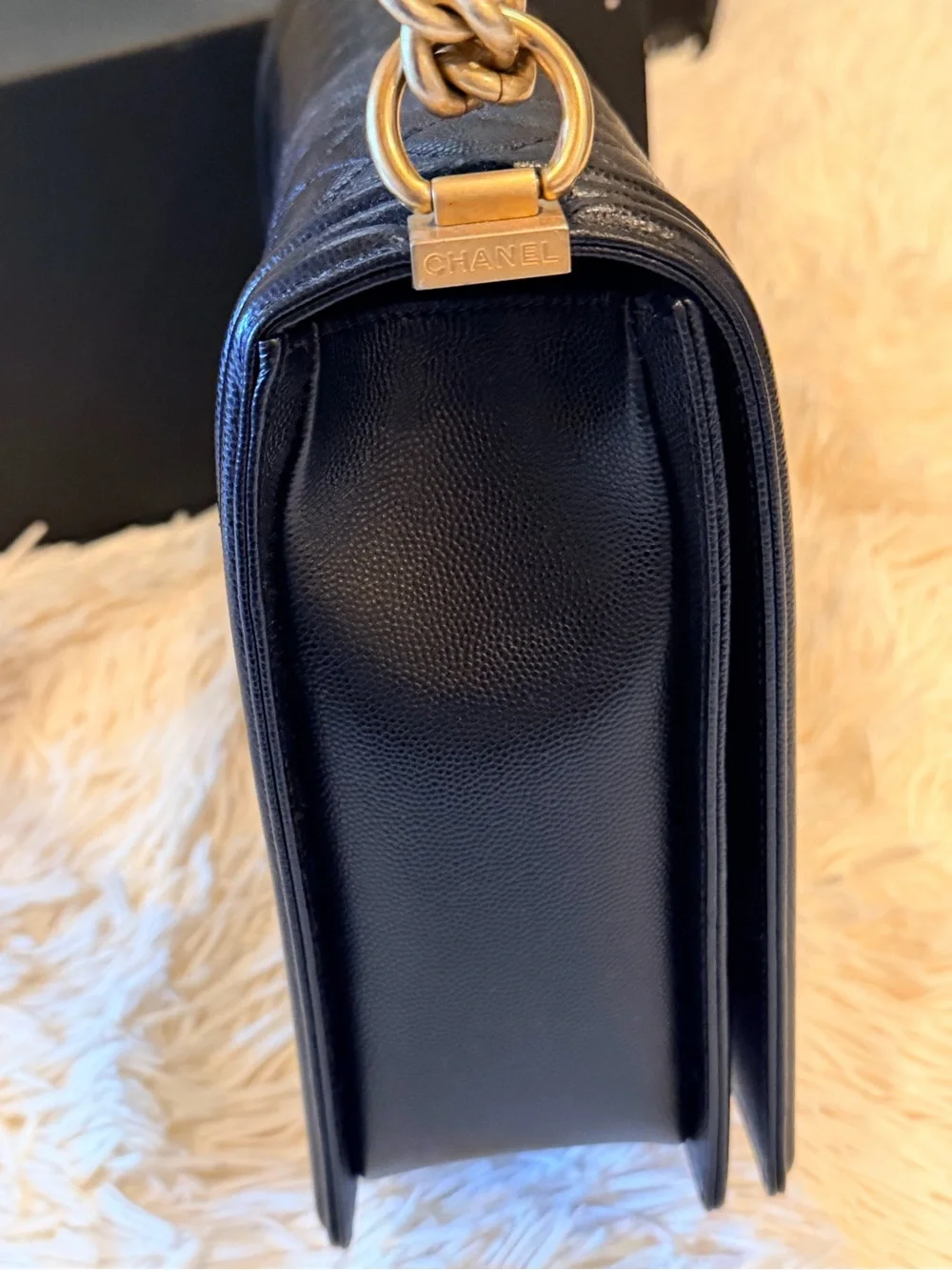 CHANEL Black Quilted Shoulder Bag with Gold Hardware and Chain Strap